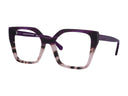 Purple and tortoiseshell eyeglasses on a white background