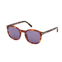 Brown havana-framed sunglasses on a white background.