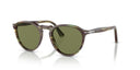 Sunglasses with green lenses and tortoiseshell frame on a white background