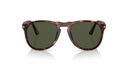 Sunglasses with tortoise frame and dark lenses on a white background
