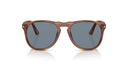 Brown sunglasses with dark lenses on a white background