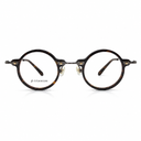 Round tortoise eyeglasses on a white background