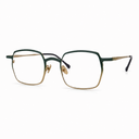 Pair of eyeglasses with a gold and green frame on a white background