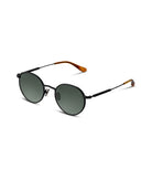 Sunglasses with round lenses and black frames on a white background