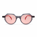 Sunglasses with pink lenses and black frames on a white background
