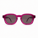 Pink sunglasses with dark lenses on a white background