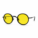 Round tinted yellow sunglasses with black frames on a white background