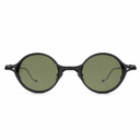 Round sunglasses with black frame and green lenses on a white background