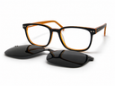 Eyeglasses with clip-on sunglasses on a white background