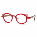 Red eyeglasses with gold accents on a white background