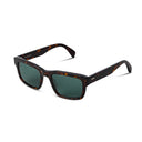 Sunglasses with tortoiseshell frame and dark lenses on a white background