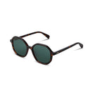 Sunglasses with tortoiseshell frame and dark lenses on a white background