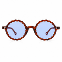 Front angle of round tortoiseshell glasses with blue lenses on a white background. 