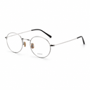 Round metal eyeglasses with thin silver rims, clear lenses, and black temple arms, shown on a plain white background.