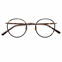 Round dark colored eyeglasses on a white background. 