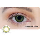 Close-up of an eye wearing Gemstone Green contact lenses with a close-up of the lens below.