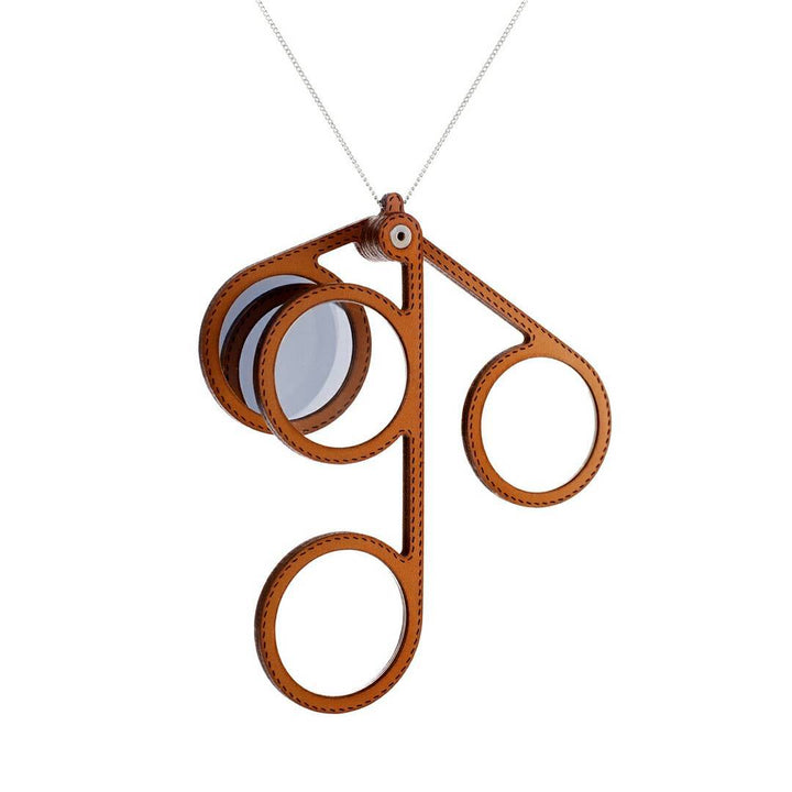 Lucas de Stael trinocle - modular eyewear that combines a mirror, binocle, and magnifying glass - camel color