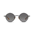 Front angle of a dark colored frame with dark colored lenses on a white background. 