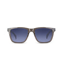 A pair of square sunglasses with a translucent gray acetate frame and blue gradient lenses, shown against a plain white background.