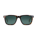 Front angle of dark havana framed eyeglasses with green lenses on a white background