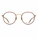 Front angle of tortoiseshell framed round eyeglasses on a white background. 