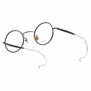 Side angle of round silver framed eyeglasses on a white background. 
