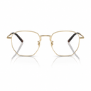 Gold metal eyeglass frames with a thin hexagonal shape and dark brown acetate temple tips, shown on a clean white background with a soft reflection.
