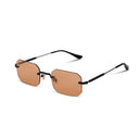 Sunglasses with brown lenses and black frames on a white background