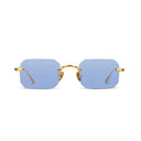 Rimless square sunglasses with light blue lenses and a gold metal frame, shown against a plain white background.