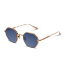 Side angle of rose gold sunglasses with blue lenses on a white background. 
