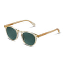 Round sunglasses with translucent cream acetate frames, gold metal temples, and dark green lenses, shown on a plain white background.