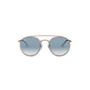 Round sunglasses with rose gold frame and blue lens