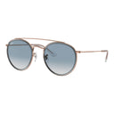 Round sunglasses with rose gold frame and blue  lenses on a white background