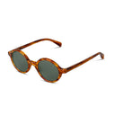 Oval sunglasses with a translucent amber-brown tortoiseshell frame and dark green lenses, shown on a plain white background.