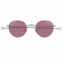 Oversized round sunglasses with thin metal frames and muted pink-purple lenses, shown against a plain white background.