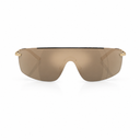 A pair of shield-style sunglasses with a large tinted brown lens and slim gold metal temples, shown against a plain white background.