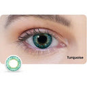 Close-up of an eye wearing turquoise contact lenses with a small inset showing the lens.