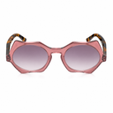 Pink sunglasses with tortoiseshell arms on a white background